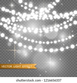 Christmas bright, beautiful lights, design elements. Glowing lights for design of Xmas greeting cards. Garlands, light Christmas decorations.
