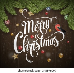 Christmas calligraphy. Hand drawn design elements. Christmas wooden background with fir branches and bullfinch. Vector illustration. Hand drawing inscription. Festive template for advertising, banner