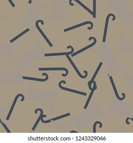 Christmas camouflage of various shades of beige and blue colors. It is a colorful seamless pattern that can be used as a camo print for clothing and background and backdrop or computer wallpaper