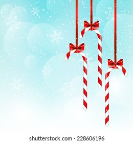 Christmas candies on blue sky background