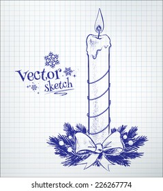 Christmas candle drawn on checkered paper. Vector illustration. isolated.