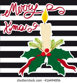 Christmas candle with evergreen decorations