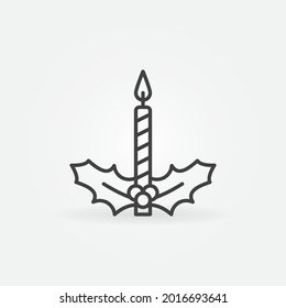 Christmas Candle with Mistletoe vector concept icon or symbol in thin line style 