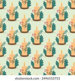 Christmas candle pattern on a green background. Concept of Christmas holidays.