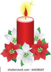 Christmas candle and poinsettia flower