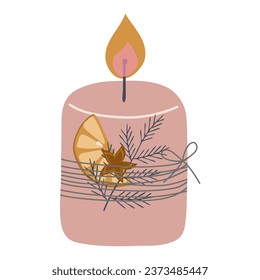 Christmas candle with spruce branch, star anise and dried orange slice. Winter holiday new year decoration.