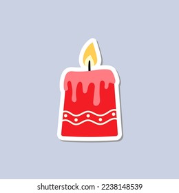 Christmas candle sticker. A festive sticker icon with a candle. Vector illustration