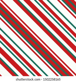 Christmas candy cane pattern. Green. red and white diagonal lines. Seamless vector illustration