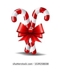 Christmas candy cane with red bow isolated on white background. Vector EPS 10.