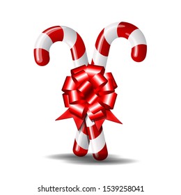 Christmas candy cane with red bow isolated on white background. Vector EPS 10.