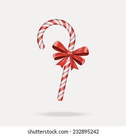 Christmas Candy Cane with red bow isolated on white background. Happy holidays and merry celebrations. Vector illustration EPS10