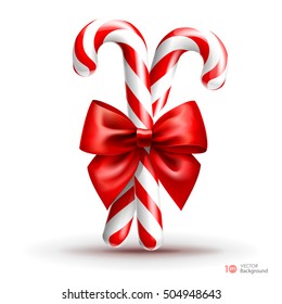 Christmas candy cane with red bow  isolated on white background. Vector  EPS 10.