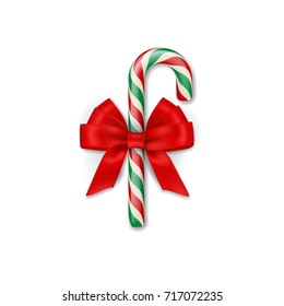 Christmas candy cane with red bow. Vector Christmas or New Year design element.

