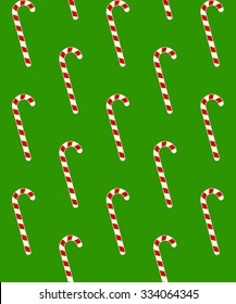 Christmas candy cane red and white striped sugar sticks pattern on green background - seamless repeatable pattern