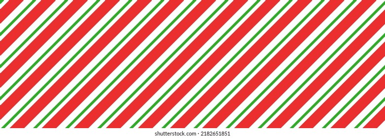 Christmas candy cane striped seamless pattern. Christmas candycane background with red and green stripes. Peppermint caramel diagonal print. Xmas traditional wrapping texture. Vector illustration.