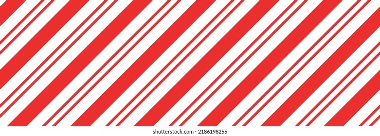 Christmas candy cane striped seamless pattern. Christmas candycane background with red stripes. Caramel diagonal print. Xmas traditional wrapping texture. Vector illustration.