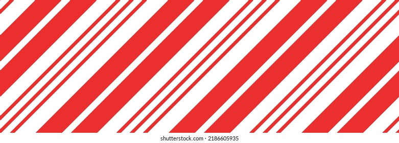 Christmas candy cane striped seamless pattern. Christmas candycane background with red stripes. Caramel diagonal print. Xmas traditional wrapping texture. Vector illustration.