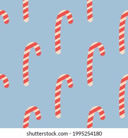 Weihnachtskerzenstreifen aus Zuckerrohr nahtlos in Rot und Weiß. Beliebter Winter-festlicher Hintergrund. Wiederholung des Fliesenmusters
