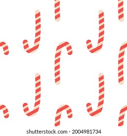 Christmas candy cane stripes seamless pattern in red and white. Popular winter festive background. Repeating tile pattern