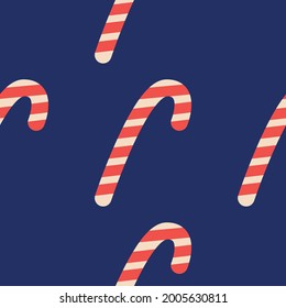 Christmas candy cane stripes seamless pattern in red and white. Popular winter festive background. Repeating tile pattern