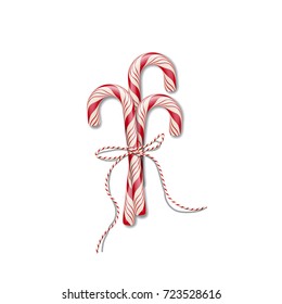 Christmas candy canes with red string. Vector Christmas or New Year design element.