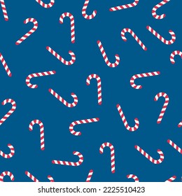 Patrón de caramelos de Navidad con fondo azul. Papel de embalaje de vacaciones. Sencilla textura retro sin fisuras