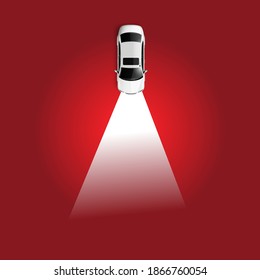 Christmas car focus light with Christmas tree shadow on red background.