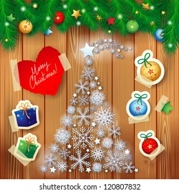 Christmas card with abstract tree on wood, vector