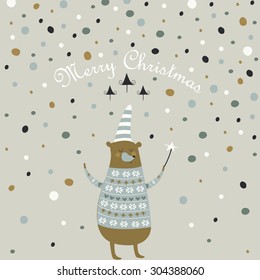 Christmas card with cute christmas bear in winter cap and knitted sweater holding magic wand