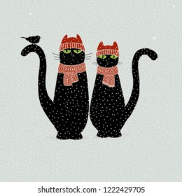 Christmas card with cute cartoon black cats on blue background