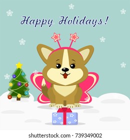 Christmas card with cute puppy Corgi in butterfly costume, sitting next to a decorated Christmas tree and a gift box against the background of snowflakes.