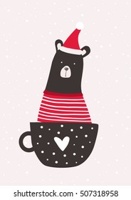 Christmas card with cute santa bear in a cup