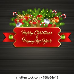Christmas card with gift boxes with gold ribbon bow, garland, Christmas tree balls, candy sticks, branches of Christmas tree behind red label with greeting text of Merry Christmas and Happy New Year