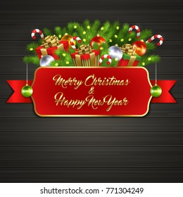 Christmas card with gift boxes with gold ribbon bow, garland, Christmas tree balls, candy sticks, branches of Christmas tree behind red label with greeting text of Merry Christmas and Happy New Year