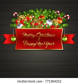 Christmas card with gift boxes with gold ribbon bow, garland, Christmas tree balls, candy sticks, branches of Christmas tree behind red label with greeting text of Merry Christmas and Happy New Year