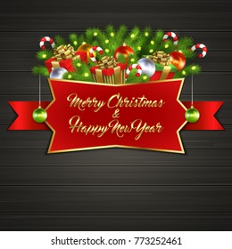 Christmas card with gift boxes with gold ribbon bow, garland, Christmas tree balls, candy sticks, branches of Christmas tree behind red label with greeting text of Merry Christmas and Happy New Year