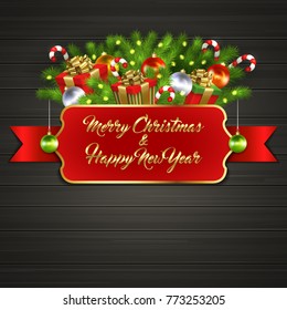 Christmas card with gift boxes with gold ribbon bow, garland, Christmas tree balls, candy sticks, branches of Christmas tree behind red label with greeting text of Merry Christmas and Happy New Year