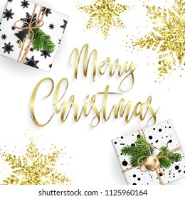 Christmas card. Gift boxes and merry Christmas gold inscription. Snowflakes and glitter. White clean background.