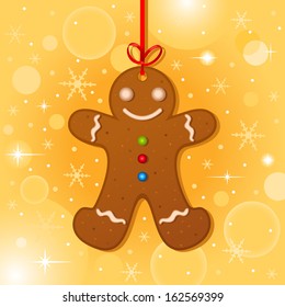 Christmas card with gingerbread man hanging with red ribbon