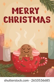 Christmas card with gingerbread in a mug, candles, fir branches and a Christmas tree ball.