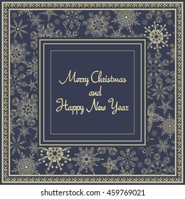 Christmas card with gold snowflakes on dark blue background. 