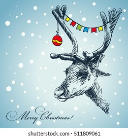 Christmas card hand drawn deer with decoration hanging in his antlers
