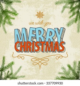 Christmas card with a hand-made letters and branches of conifers