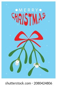 A Christmas card with the inscription merry Christmas and a sprig of mistletoe