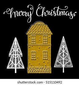 Christmas card. Merry Christmas hand written calligraphy font. Trees, house hand drawn isolated on black background. White, gold colored