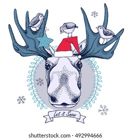 Christmas card. Moose portrait in a Santa's cap and birds on a blue-gray frame. Vector illustration.