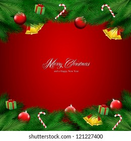 Christmas card with pine tree branches, Christmas ornaments and candy on a red background.