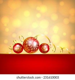 Christmas card with red baubles on golden background 