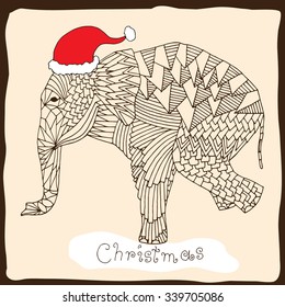 Christmas card. Stylized fantasy patterned elephant. Hand drawn vector illustration with floral elements. Original hand drawn elephant in Christmas mood