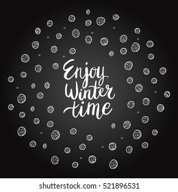 Christmas card template. Hand drawn lettering Enjoy winter time. Perfect brush typography for cards, poster, t-shirt, invitations and other types of holiday design. Vector illustration.